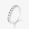 Alianza entera de oro blanco de 18K con 10 diamantes en talla brillante con un total de 1 cts
