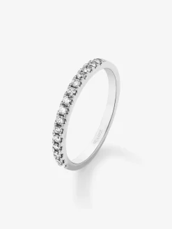 Anillo alianza media de compromiso de oro blanco de 18K con diamantes en garra 0,25ct