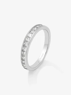 Anillo alianza media de compromiso de oro blanco de 18K con diamantes en talla princesa en carril 0,70ct