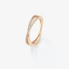 Anillo cruzado de oro rosa de 18K con 24 diamantes blancos en talla brillante con un total de 0,07 cts