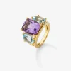 Anillo de oro amarillo de 18K con amatista morada en talla cushion de 5,5 cts, topacios azul sky en talla oval de 4,65 cts y diamantes blancos en talla brillante de 0,15 cts
