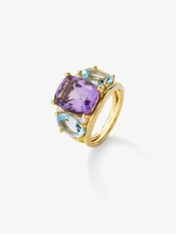 Anillo de oro amarillo de 18K con amatista morada en talla cushion de 5,5 cts, topacios azul sky en talla oval de 4,65 cts y diamantes blancos en talla brillante de 0,15 cts