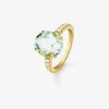 Anillo de oro amarillo de 18K con amatista verde en talla oval de 4,34 cts y 12 diamantes en talla brillante con un total de 0,29 cts