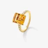 Anillo de oro amarillo de 18K con cuarzo citrino en talla esmeralda de 3,7 cts y 14 diamantes en talla brillante con un total de 0,32 cts
