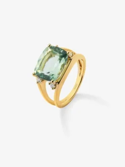 Anillo de oro amarillo de 18K con amatista verde en talla cushion de 7,3 cts y 4 diamantes en talla brillante con un total de 0,13 cts