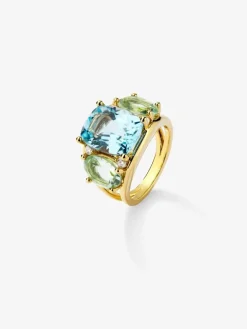Anillo de oro amarillo de 18K con topacio azul sky en talla cushion de 5,5 cts, amatistas verdes en talla oval de 4,65 cts y diamantes blancos en talla brillante de 0,15 cts