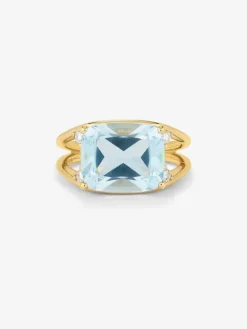 Anillo de oro amarillo de 18K con topacio azul sky en talla cushion de 7,3 cts y diamantes blancos en talla brillante de 0,13 cts