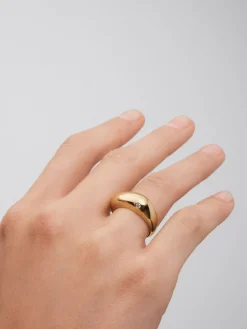Anillo de oro amarillo de 18K con diamante en talla brillante de 0,03 cts