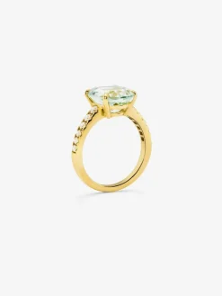 Anillo de oro amarillo de 18K con amatista verde en talla oval de 4,34 cts y 12 diamantes en talla brillante con un total de 0,29 cts