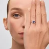 Anillo de oro blanco de 18K con tanzanita en talla cushion de 1,17 cts y 38 diamantes en talla brillante con un total de 0,31 cts