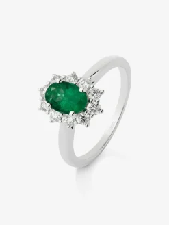 Anillo de oro blanco de 18K con esmeralda verde en talla oval de 0,5 cts y diamantes en talla brillante con un total de 0,18 cts