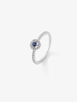 Anillo de oro blanco de 18K con 33 diamantes en talla brillante de con un total 0,18 cts y zafiro azul en talla brillante con un total de 0,08 cts