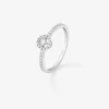 Anillo de oro blanco de 18K con diamante central en talla brillante en talla brillante de 0,06 cts y orla y brazo de 33 diamantes en talla brillante con un total de 0,18 cts
