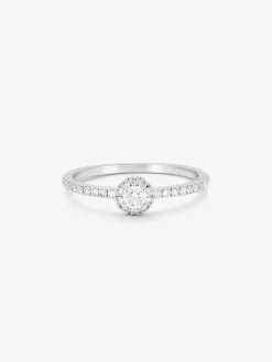 Anillo de oro blanco de 18K con diamante central en talla brillante de 0,1 cts y 28 diamantes en talla brillante con un total de 0,2 cts