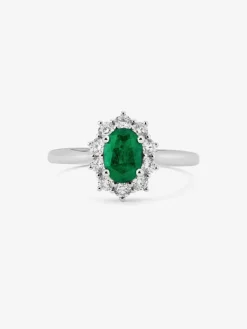 Anillo de oro blanco de 18K con esmeralda verde en talla oval de 0,5 cts y diamantes en talla brillante con un total de 0,18 cts