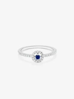 Anillo de oro blanco de 18K con 33 diamantes en talla brillante de con un total 0,18 cts y zafiro azul en talla brillante con un total de 0,08 cts