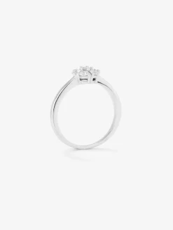Anillo de oro blanco de 18K con orla de 6 diamantes en talla brillante con un total de 0,4 cts
