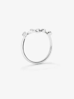 Anillo de oro blanco de 18K con 18 diamantes en talla brillante con un total de 0,07 cts y forma de hojas