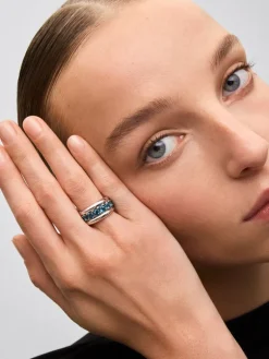 Anillo de plata 925 con pavé de topacios azul london en talla brillante