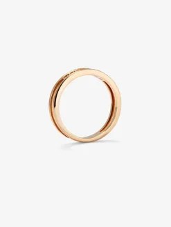 Anillo doble de oro rosa de 18K con 7 diamantes en talla brillante con un total de 0,1 cts