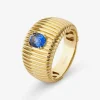 Anillo gallonado de oro amarillo de 18K con zafiro azul en talla oval