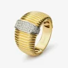 Anillo gallonado de oro blanco y amarillo de 18K con pavé de diamantes en talla brillante con un total de 0,19 cts