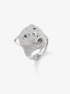 Anillo puma de oro blanco de 18kt con diamantes y zafiros azules