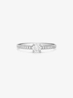 Anillo solitario de compromiso de oro blanco de 18K con diamantes