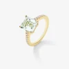 Anillo solitario de oro amarillo de 18K con amatista verde en talla octogonal de 2,96 cts y 18 diamantes en talla brillante con un total de 0,19 cts