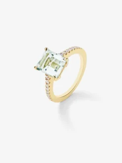 Anillo solitario de oro amarillo de 18K con amatista verde en talla octogonal de 2,96 cts y 18 diamantes en talla brillante con un total de 0,19 cts