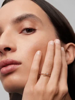 Anillo tú y yo de oro rosa de 18K con diamante blanco en talla brillante