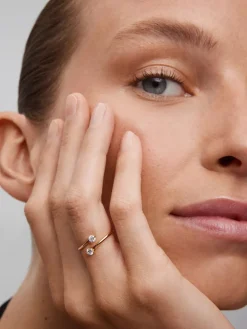 Anillo tú y yo de oro rosa de 18K con 2 diamantes en talla brillante con un total de 0,26 cts
