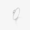 Anillo tresillo de oro blanco de 18K con diamantes