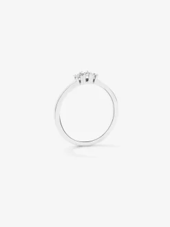 Anillo tresillo de oro blanco de 18K con diamantes