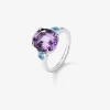 Anillo tresillo de plata 925 con amatista morada en talla oval y 2 topacios azul swiss en talla brillante