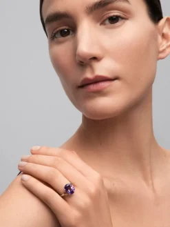 Anillo tresillo de plata 925 con amatista morada en talla oval y 2 cuarzos citrinos en talla brillante