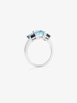 Anillo tresillo de plata 925 con un topacio azul sky en talla oval de 2,31 cts y 2 topacios azul london en talla oval con un total de 1,71 cts