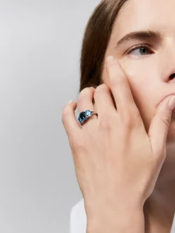 Anillo tresillo de plata 925 con topacios