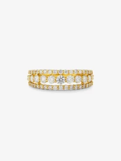 Anillo triple de oro amarillo de 18K con 45 diamantes en talla brillante con un total de 0,93 cts
