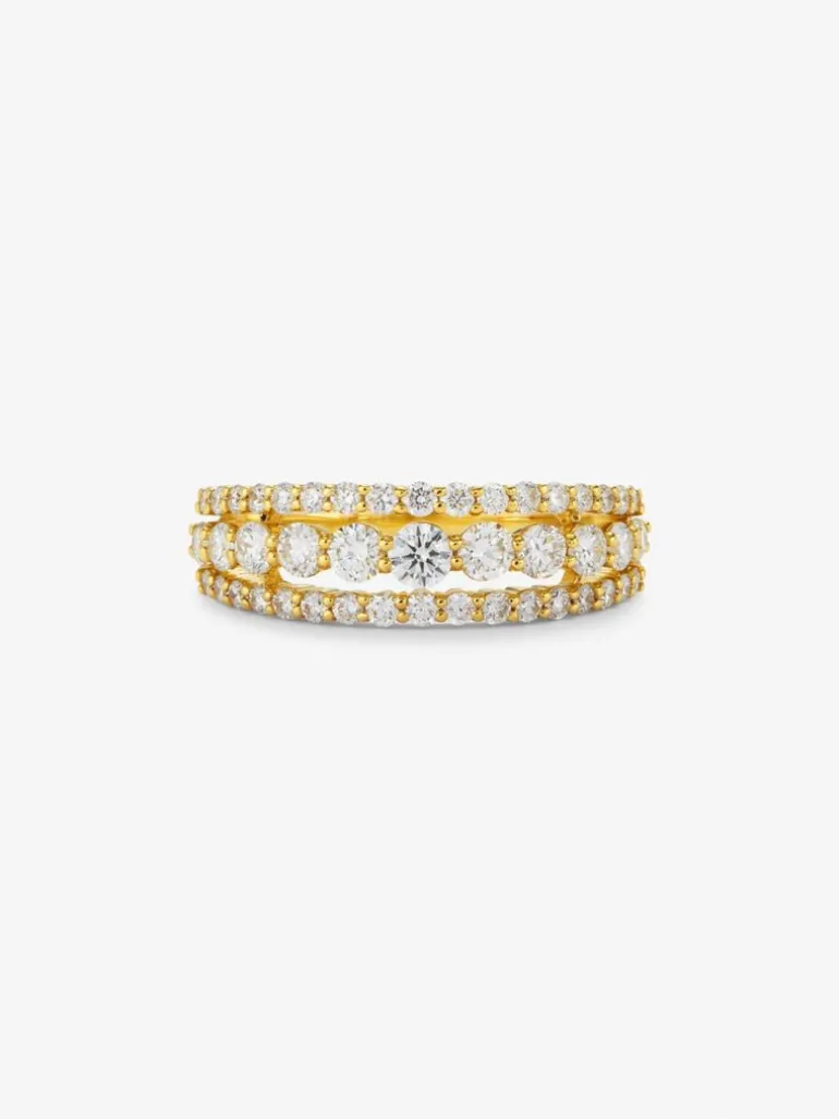Anillo triple de oro amarillo de 18K con 45 diamantes en talla brillante con un total de 0,93 cts