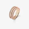 Anillo triple de oro rosa de 18K con 55 diamantes en talla brillante con un total de 0,68 cts