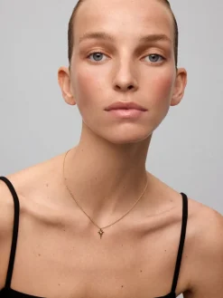 Colgante cadena con estrella de oro rosa de 18K con diamante