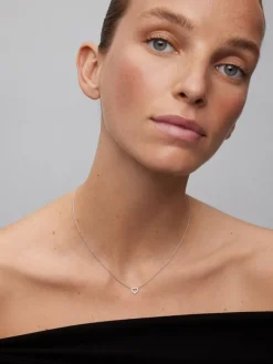 Colgante cadena corazón de oro blanco de 18K y diamantes