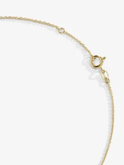 Colgante cadena cruz en oro amarillo de 18K con diamantes