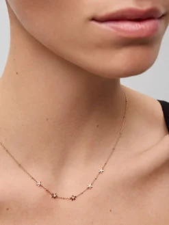 Colgante con estrellas de oro rosa de 18kt con diamantes