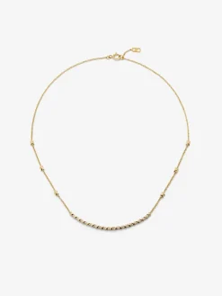 Colgante de oro amarillo de 18K con 18 diamantes en talla brillante con un total de 0,25 cts