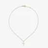 Colgante de oro amarillo de 18K con cruz mediana y diamante en talla brillante de 0,01 cts