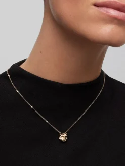 Colgante de oro amarillo de 18K con 29 diamantes en talla brillante con un total de 0,25 cts y forma de tigre
