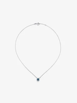 Colgante de oro blanco de 18K con topacio azul london de 0,57 cts y diamantes 0,13 cts
