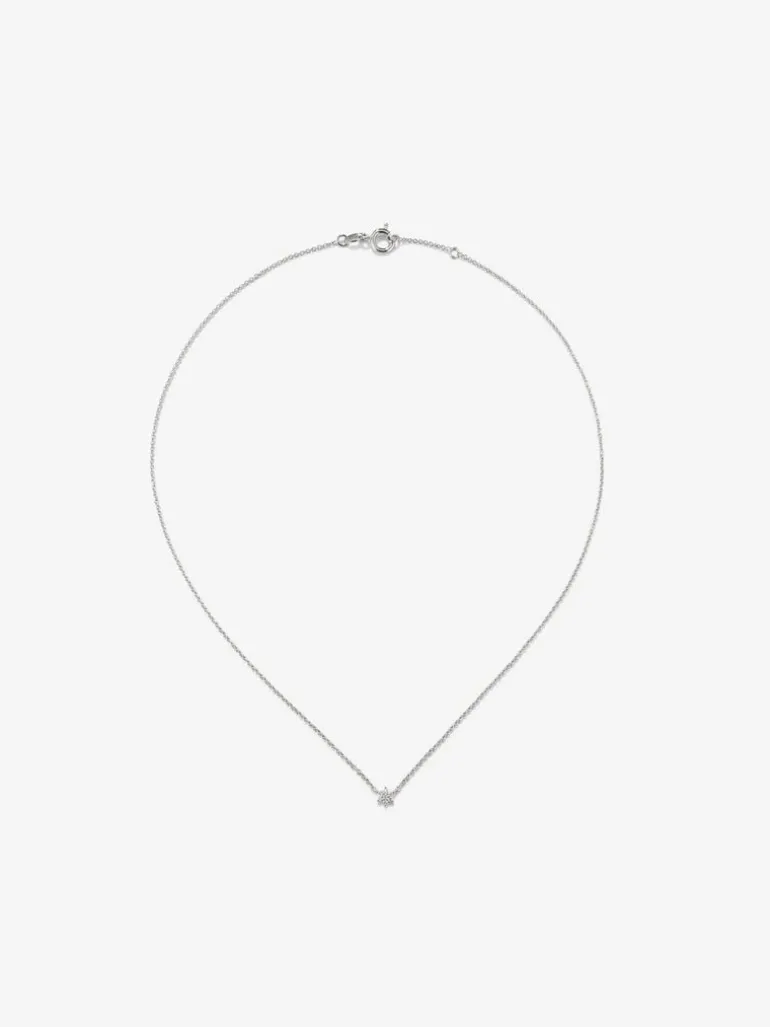 Colgante de oro blanco de 18K con diamantes 0,21 cts en forma de estrella